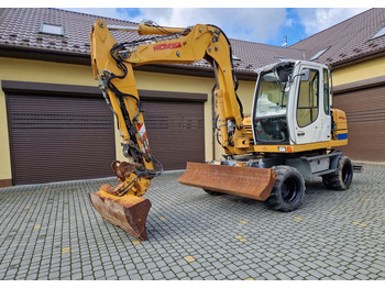 Excavadora de ruedas LIEBHERR A 311